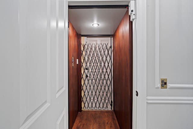 26 Commanders Pt, Missouri City, TX 77459 - doorway to outside with elevator and wood finished floors