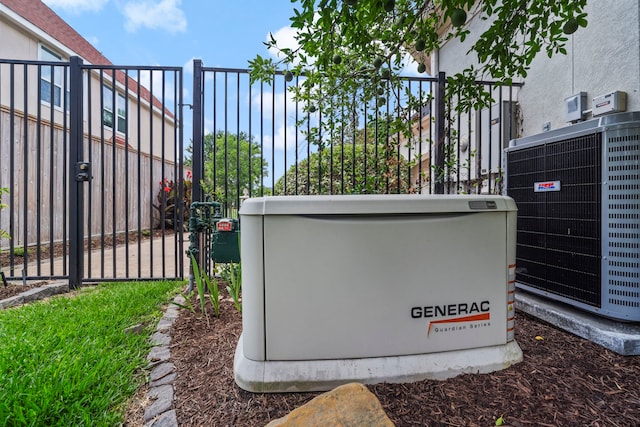26 Commanders Pt, Missouri City, TX 77459 - exterior view of a power unit, central air condition unit, a gate, and gas meter