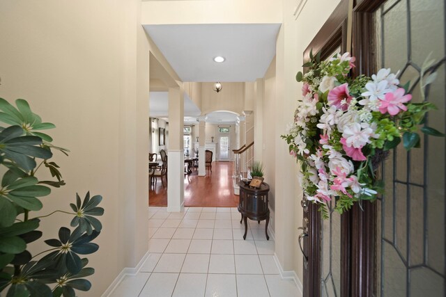 1123 Mariner Cv, Sugar Land, TX 77498 - entryway with ornate columns, light tile patterned floors, baseboards, and recessed lighting