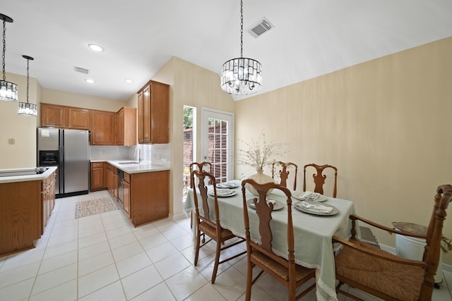 1123 Mariner Cv, Sugar Land, TX 77498 - dining space featuring a chandelier, light tile patterned floors, and recessed lighting