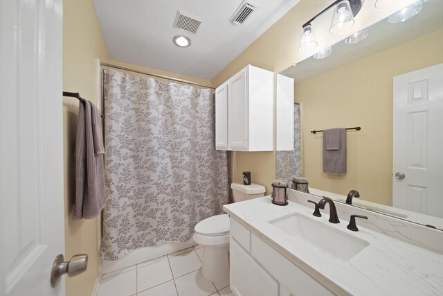 1123 Mariner Cv, Sugar Land, TX 77498 - bathroom with vanity, tile patterned floors, toilet, and a shower with shower curtain