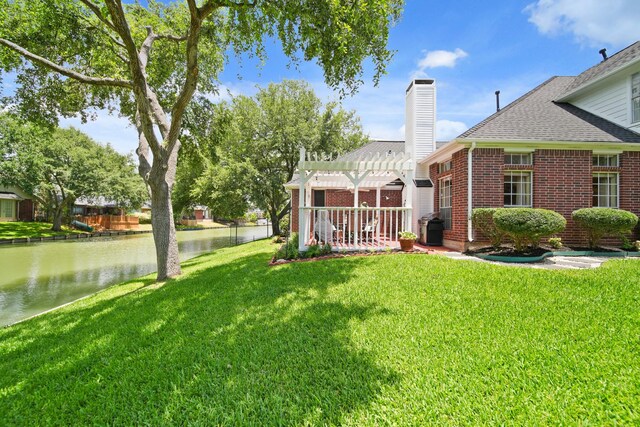 1123 Mariner Cv, Sugar Land, TX 77498 - view of yard with a pergola, a water view, and a patio area