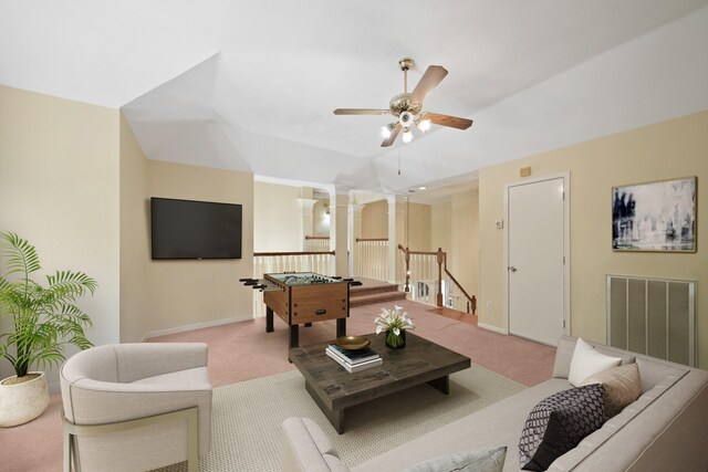 1123 Mariner Cv, Sugar Land, TX 77498 - living area featuring carpet floors, a ceiling fan, baseboards, and ornate columns