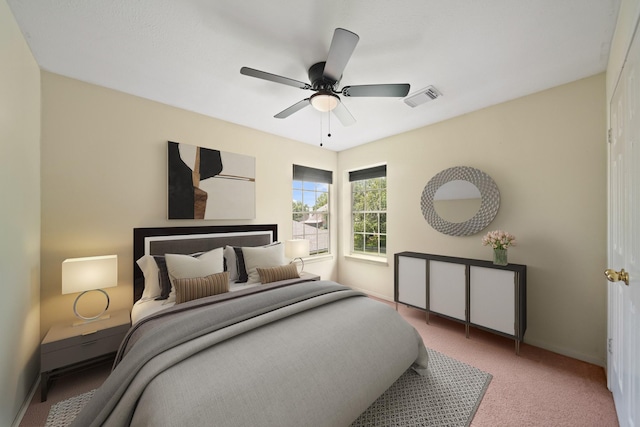 1123 Mariner Cv, Sugar Land, TX 77498 - carpeted bedroom with baseboards and ceiling fan