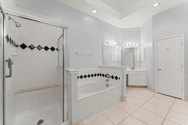1030 Evandale Ln, Sugar Land, TX 77479 - full bath featuring a bath, tile patterned floors, a stall shower, vanity, and recessed lighting