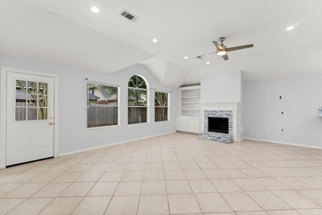 1030 Evandale Ln, Sugar Land, TX 77479 - unfurnished living room with vaulted ceiling, ceiling fan, recessed lighting, built in shelves, and a fireplace with raised hearth