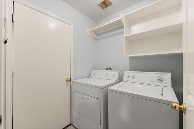 1030 Evandale Ln, Sugar Land, TX 77479 - laundry room featuring washer and dryer