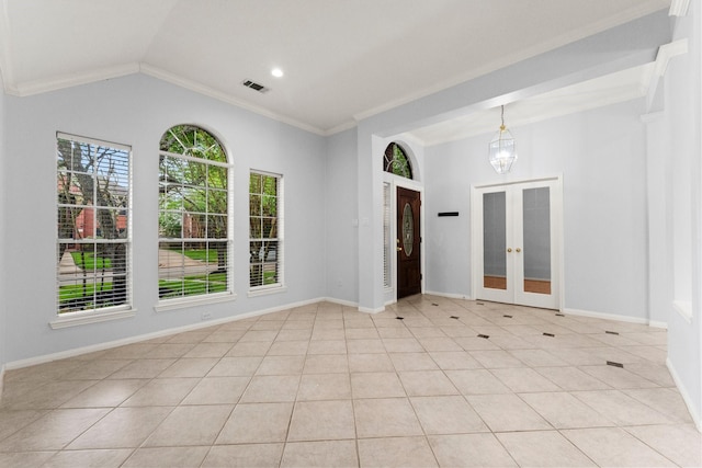 1030 Evandale Ln, Sugar Land, TX 77479 - spare room with crown molding, french doors, light tile patterned floors, a chandelier, and baseboards