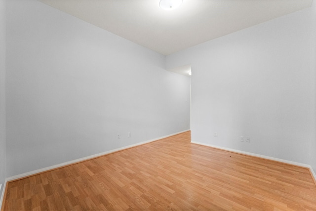 1030 Evandale Ln, Sugar Land, TX 77479 - empty room featuring wood finished floors and baseboards