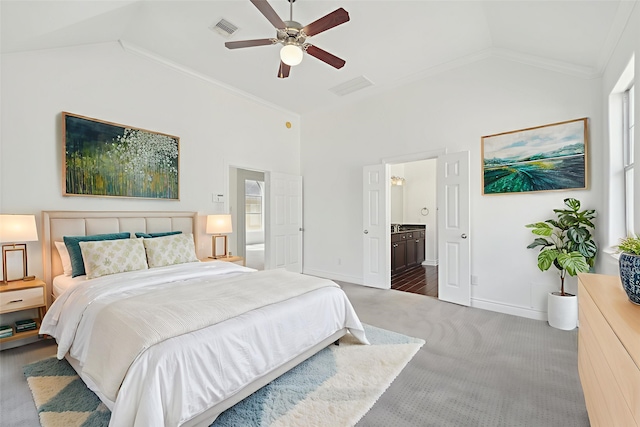 5731 Kansas St, Houston, TX 77007 - bedroom with carpet, baseboards, ensuite bathroom, crown molding, and ceiling fan