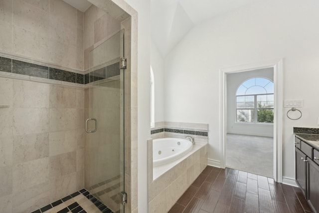 5731 Kansas St, Houston, TX 77007 - bathroom featuring a jetted tub, a stall shower, and vanity