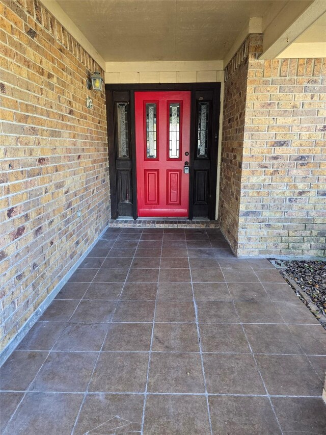 5000 Magnolia Ln, Bay City, TX 77414 - doorway to property with brick siding