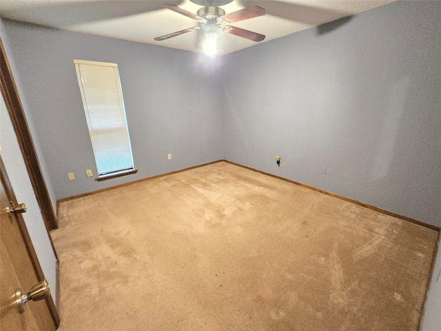 5000 Magnolia Ln, Bay City, TX 77414 - unfurnished room featuring ceiling fan, carpet floors, and baseboards