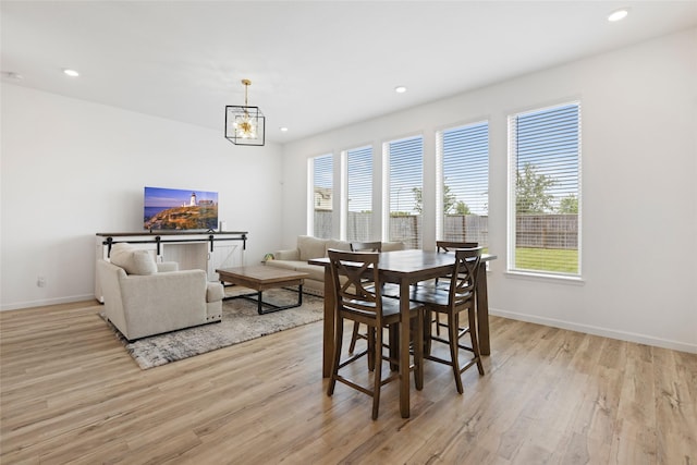 4234 Balboa Dr, Iowa Colony, TX 77583 - dining space featuring healthy amount of natural light, light wood finished floors, recessed lighting, baseboards, and a chandelier