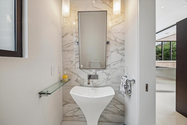 2110 Tangley St, Houston, TX 77005 - bathroom featuring tile walls