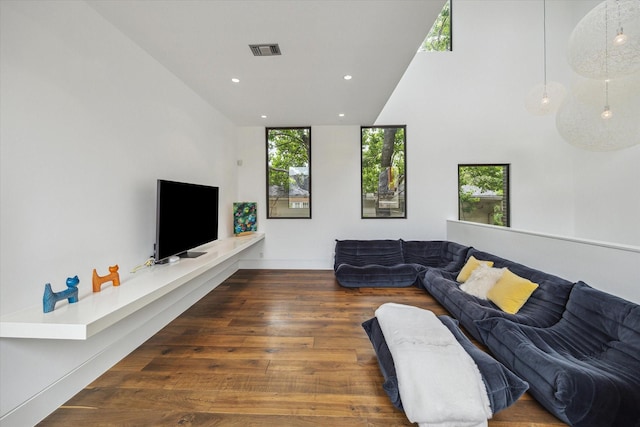2110 Tangley St, Houston, TX 77005 - living area featuring wood finished floors, recessed lighting, and a high ceiling