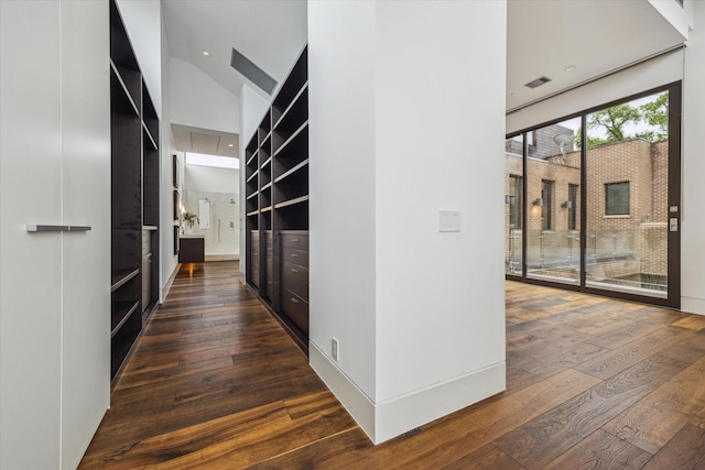 2110 Tangley St, Houston, TX 77005 - hall featuring dark wood-type flooring and vaulted ceiling
