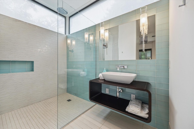 2110 Tangley St, Houston, TX 77005 - full bathroom featuring tile walls, walk in shower, tile patterned flooring, and vanity