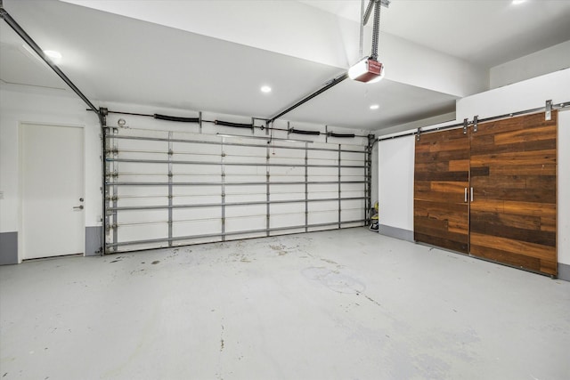 2110 Tangley St, Houston, TX 77005 - garage featuring a garage door opener and recessed lighting