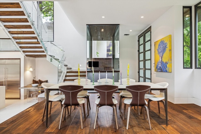 2110 Tangley St, Houston, TX 77005 - dining space featuring stairs, wood-type flooring, and recessed lighting