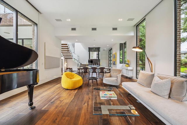 2110 Tangley St, Houston, TX 77005 - living area featuring stairway and hardwood / wood-style flooring
