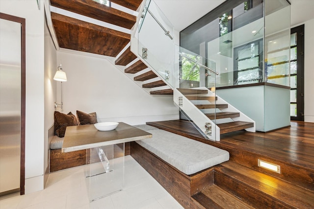 2110 Tangley St, Houston, TX 77005 - stairs featuring healthy amount of natural light and tile patterned flooring