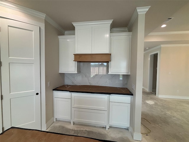 2804 Spector Dr, Bryan, TX 77808 - kitchen featuring tasteful backsplash, crown molding, dark countertops, white cabinets, and recessed lighting