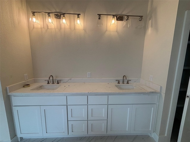 2804 Spector Dr, Bryan, TX 77808 - full bath featuring double vanity and marble look tile flooring