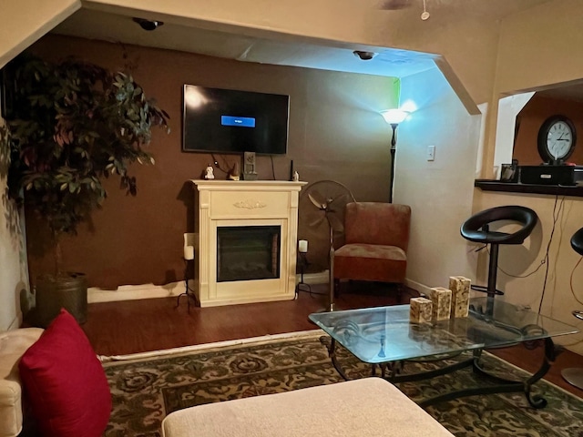 6301 Ezzard Charles Ln, Houston, TX 77091 - living area featuring wood finished floors and a glass covered fireplace