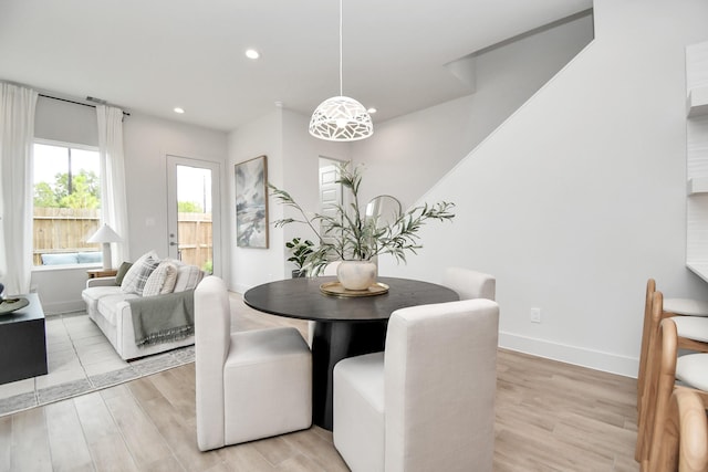 4011 Boho Ln, Houston, TX 77045 - dining area featuring light wood-style flooring, recessed lighting, and baseboards