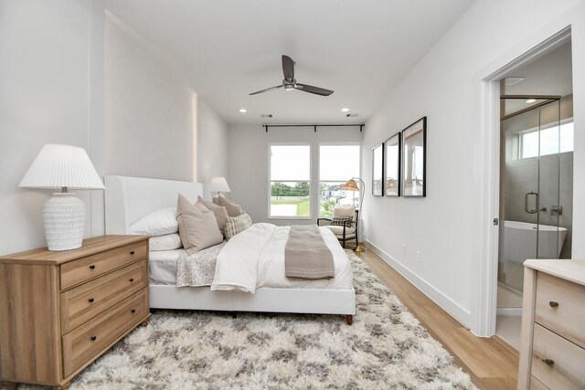 4011 Boho Ln, Houston, TX 77045 - bedroom with light wood-type flooring, baseboards, recessed lighting, and a ceiling fan