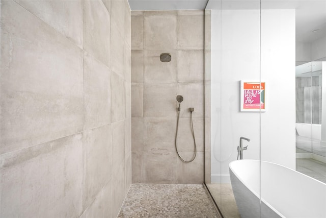 6508 Haskell St, Houston, TX 77007 - bathroom featuring a freestanding tub and tiled shower