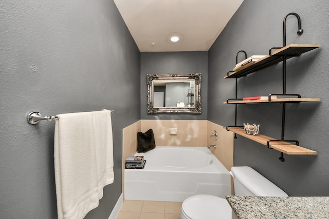 3333 Allen Pkwy Unit 1508, Houston, TX 77019 - bathroom featuring tile patterned floors, toilet, a garden tub, and vanity
