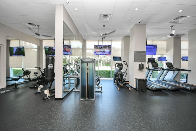 3333 Allen Pkwy Unit 1508, Houston, TX 77019 - exercise room with healthy amount of natural light, a paneled ceiling, a ceiling fan, and expansive windows