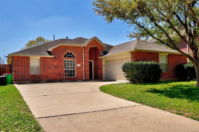 19915 Mason Creek Dr, Katy, TX 77449 - view of front of house featuring brick siding, an attached garage, driveway, and a front lawn
