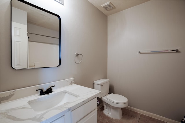 19915 Mason Creek Dr, Katy, TX 77449 - bathroom featuring toilet, tile patterned floors, vanity, and baseboards