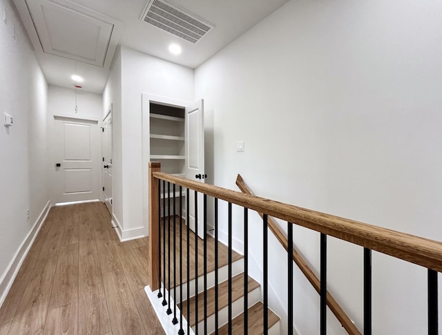 3109 Orange St, Houston, TX 77020 - hall with attic access, an upstairs landing, light wood finished floors, and recessed lighting