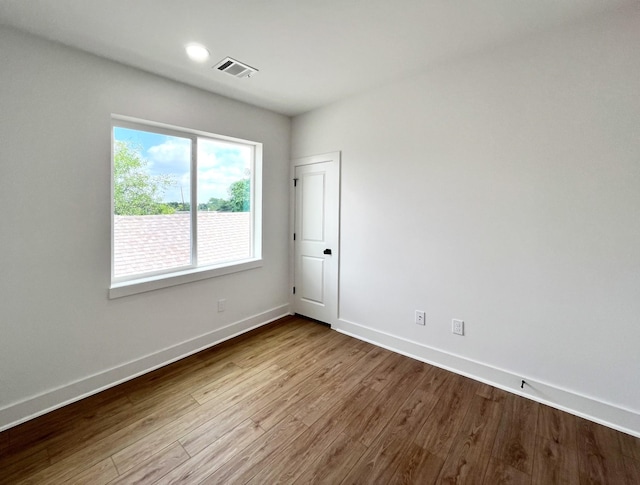 3109 Orange St, Houston, TX 77020 - empty room featuring dark wood finished floors and baseboards