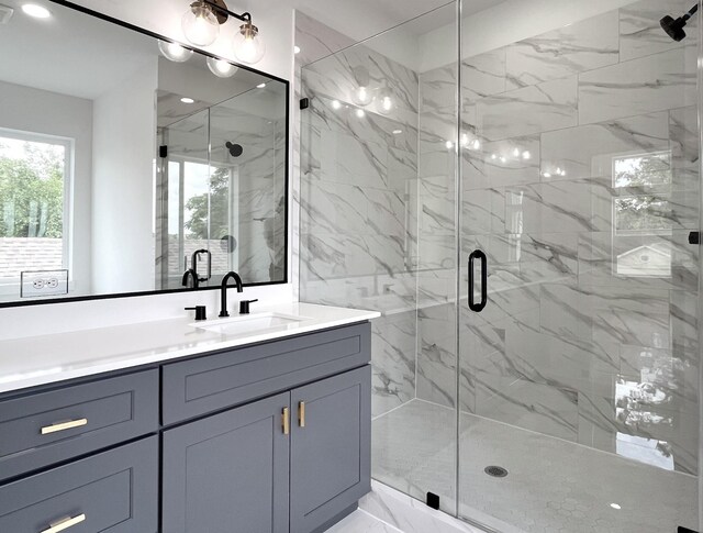 3109 Orange St, Houston, TX 77020 - full bath with vanity, a marble finish shower, marble look tiles, and recessed lighting