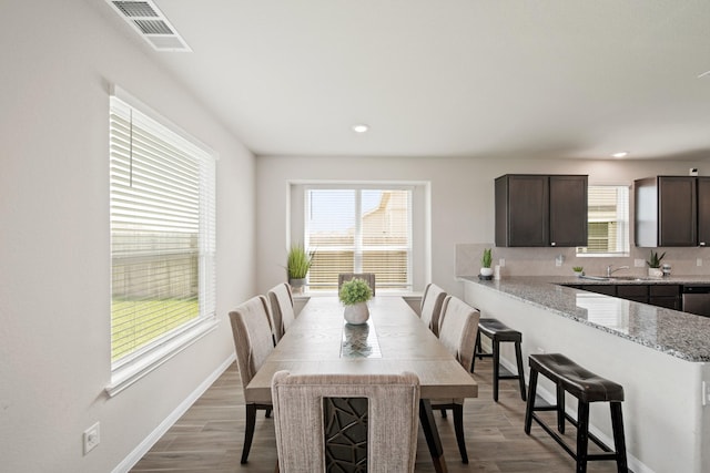 5330 Briana Dee Dr, Rosharon, TX 77583 - dining room with healthy amount of natural light, recessed lighting, light wood-style floors, and baseboards