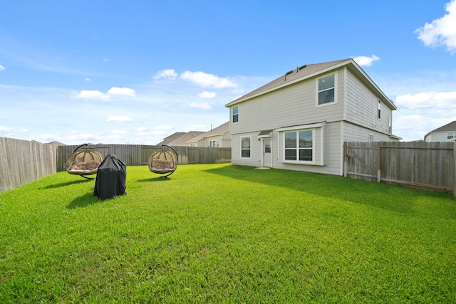 5330 Briana Dee Dr, Rosharon, TX 77583 - rear view of property with an outdoor fire pit