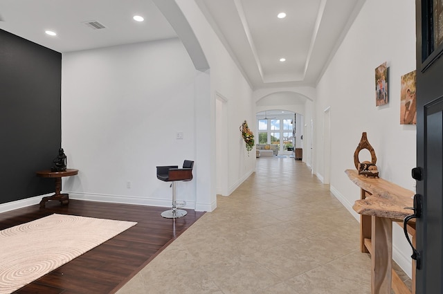 4003 N Creekmont Dr, Fresno, TX 77545 - hall featuring arched walkways, recessed lighting, baseboards, and light tile patterned floors