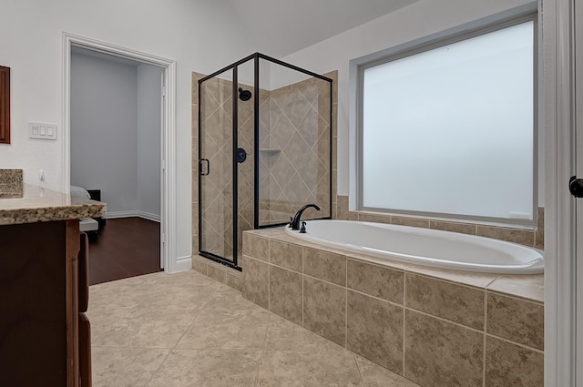 4003 N Creekmont Dr, Fresno, TX 77545 - full bathroom with a bath, a stall shower, vanity, and tile patterned floors
