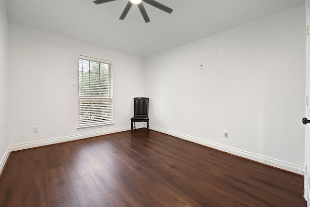 4003 N Creekmont Dr, Fresno, TX 77545 - empty room with a ceiling fan, baseboards, and dark wood-type flooring