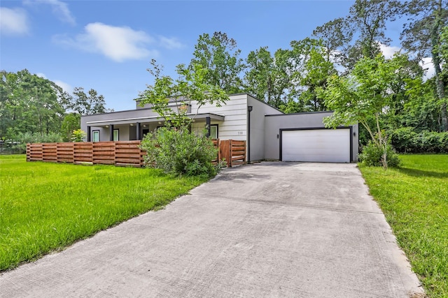 538 Magnolia Point Dr, Huffman, TX 77336 - modern home featuring driveway and an attached garage