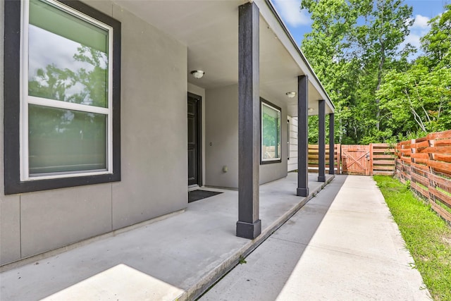 538 Magnolia Point Dr, Huffman, TX 77336 - view of patio featuring a gate