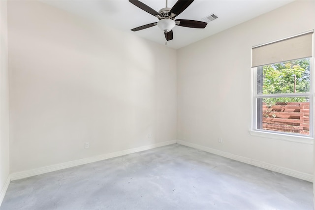 538 Magnolia Point Dr, Huffman, TX 77336 - unfurnished room with unfinished concrete flooring, baseboards, and ceiling fan