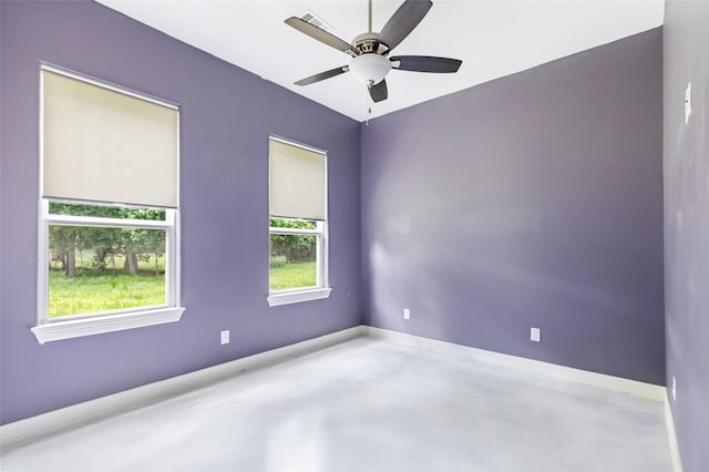 538 Magnolia Point Dr, Huffman, TX 77336 - unfurnished room featuring concrete flooring, baseboards, and ceiling fan
