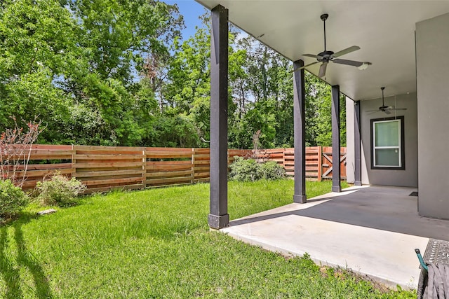 538 Magnolia Point Dr, Huffman, TX 77336 - view of yard with ceiling fan, a patio, and view of scattered trees