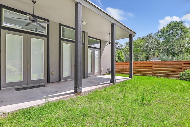 538 Magnolia Point Dr, Huffman, TX 77336 - view of yard with french doors, a ceiling fan, and a patio area